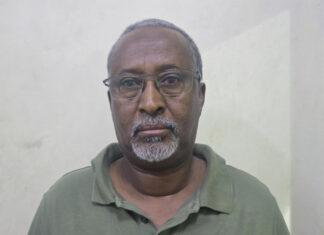 Police arrested the adviser on social affairs for the Puntland President while he was in Mogadishu.