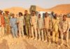 Puntland officers display weapons reportedly seized from PSF forces.