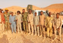 Puntland officers display weapons reportedly seized from PSF forces.